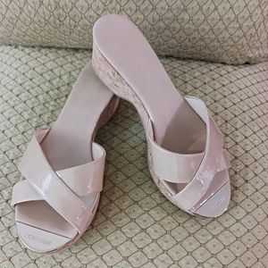 Jimmy Choo women's creme lather platform Mules.